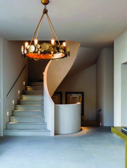 interior rounded staircase with circular lit lighting
